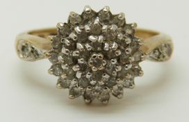 A 9ct gold ring set with diamonds in a cluster, total diamond weight approximately 0.33ct, 2.