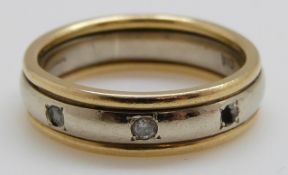 A 9ct gold ring set with diamonds, 4.