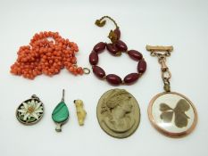 A silver fob in the form of bellows set with malachite,