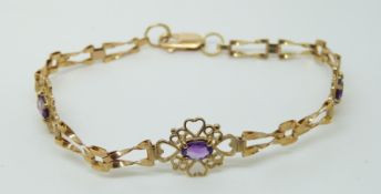 A 9ct gold bracelet set with amethysts, 4.