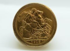 A 9ct gold ring set with a 1912 gold full sovereign, 18.