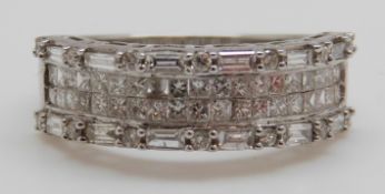 An 18ct white gold ring set with round,