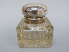 An Edward VII hallmarked silver and cut glass inkwell, Birmingham 1907,