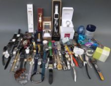 Seventy-three various ladies and gentleman's wristwatches together with various items of jewellery.
