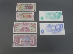 Two Trafalgar experimental banknotes, one blue one green,