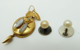 A Victorian earring in the form of an insect and two French silver studs