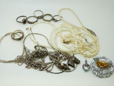 A collection of silver jewellery to include necklaces, pearl necklaces, silver rings,