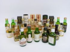 Approximately 29 single malt whisky miniatures including Knockando, Glenkinchie, Laphroiag,