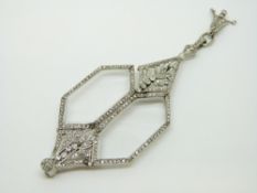 An Art Deco platinum lorgnette pendant set with rose cut and round cut diamonds,