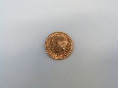 A 1945 two-and-a-half Pesos gold coin, 2.