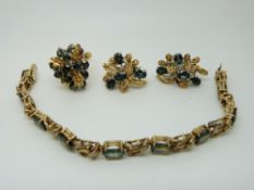 WITHDRAWN A suite of silver gilt jewellery set with green sapphires and diamonds