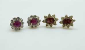 A pair of 9ct gold earrings set with rubies and diamond and another pair of 9ct gold earrings
