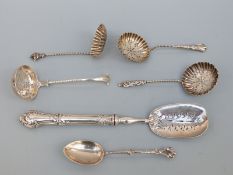 Four Victorian and later hallmarked silver sifter spoons, one Birmingham 1890,