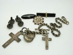 A Victorian mourning brooch set with plaited hair to the centre surrounded by paste,
