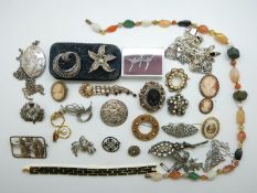 A white metal brooch depicting swans, marcasite brooches, silver brooch, paste brooch,