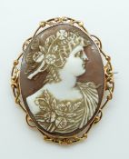 A Victorian yellow metal brooch set with a cameo, 4.