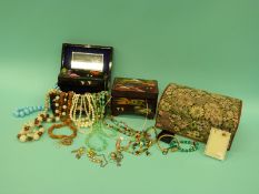 A collection of beads to include amber and two Japanese jewellery boxes
