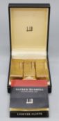 A boxed plated Dunhill lighter and two further Dunhill lighters,