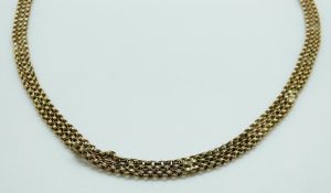 A 9ct gold three strand necklace, 16.