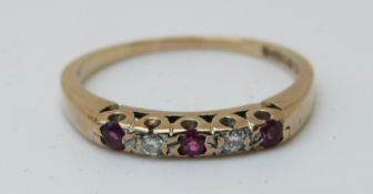 A 9ct gold ring set with rubies and diamonds (size L)