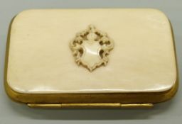 A late 18th/19thC ivory purse with carved applied cartouche,