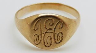 A yellow metal signet ring, 3.