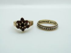 A 9ct gold ring set with garnets and a 9ct gold ring, 6.
