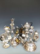 A quantity of silver plated items to include trumpet vases, serving dishes, brassware,
