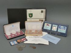 A silver commemorative Apollo-Soyuz space mission 1975 proof coin with stamp booklet etc,
