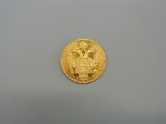 A 1915 Austrian 1 Ducat coin, 3.