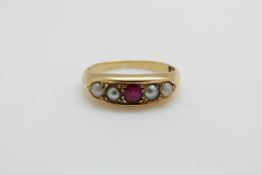 An 18ct gold ring set with a ruby and pearls, 3.