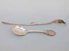 A Norwegian spoon with a scene of Bergen and pickle fork marked Lazenby's Patent