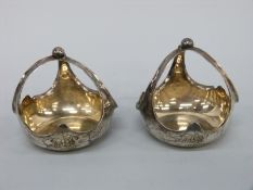 A pair of Victorian unused novelty triform handled salts, Sheffield 1888 maker Atkin Brothers,