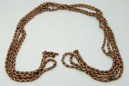 A yellow metal guard chain marked 9ct gold, 21.