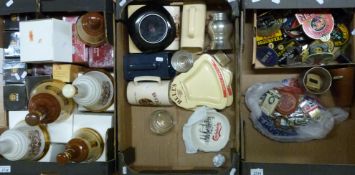A quantity of breweriana including empty Bell's whisky, pump signs, glasses,