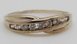 A 9ct gold ring set with cubic zirconia, 1.