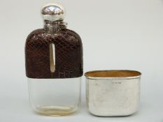 A Victorian hallmarked silver hip flask, part crocodile skin covered,
