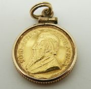 A 1/10 1980 Kugerrand in a pendant mount, 4.