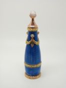 A guilloche enamel scent or perfume bottle with gold mounts set with old cut diamonds and a