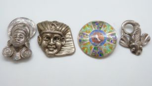 A large silver brooch depicting an Egyptian man,