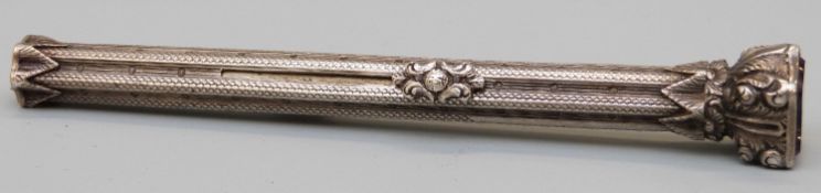 A hallmarked silver propelling pencil and pen by S.