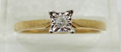 A 9ct gold ring set with a diamond in a square setting, 2.
