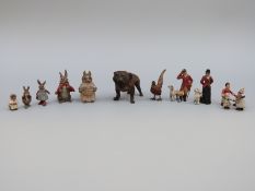 A collection of late 19thC / 20thC cold painted bronze and other miniature metal figures including