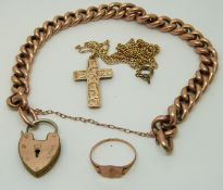 A 9ct gold curb link bracelet, a 9ct gold cross and a 9ct gold signet ring, 17.