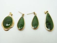 A 9ct gold pendant set with jadite and matching earrings