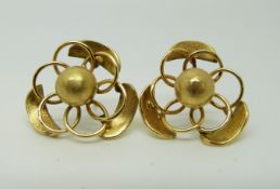 A pair of 9ct gold Edwardian earrings set with a seed pearl and peridot