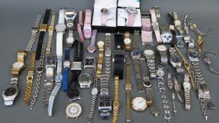 Fifty-three various ladies and gentleman's wristwatches.