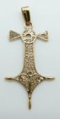 A yellow metal Sahara cross pendant, 3.