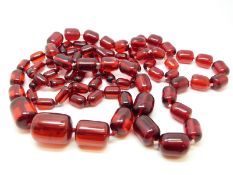 Two Bakelite barrel shaped cherry amber style beaded necklaces.