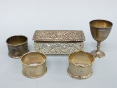 Three various hallmarked silver napkin rings,
